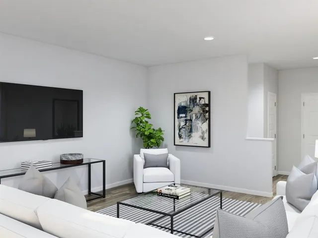 a kitchen with stainless steel appliances a refrigerator stove and microwave