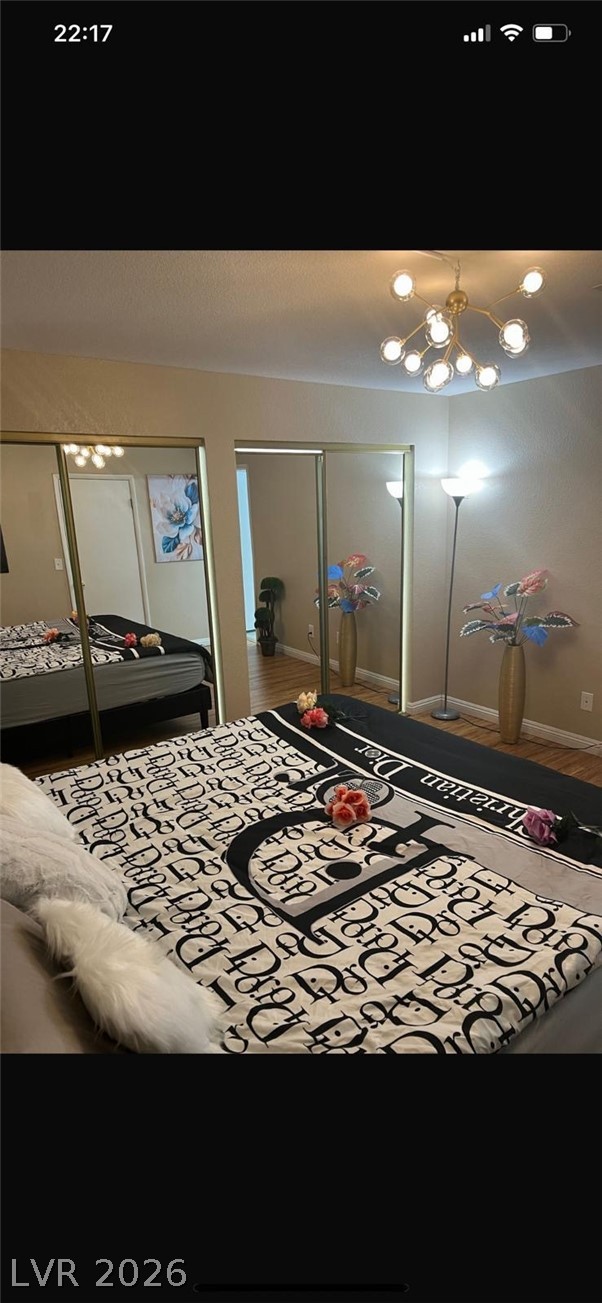 5131 South Lindell Road, Unit 205 Las Vegas, NV 89118 - Photo 18 of 22 Bedroom featuring multiple closets