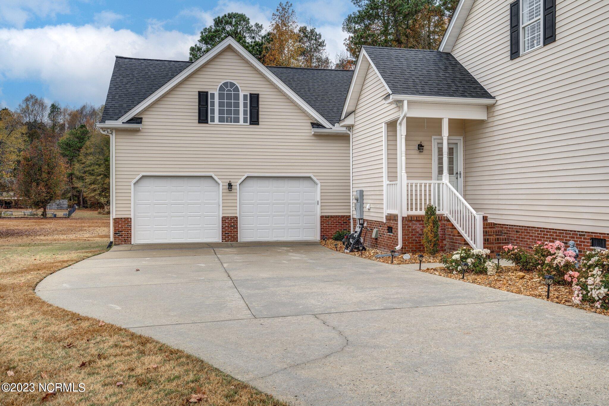 4292 Olde Bass Farm Road Rocky Mount, NC 27804 - Photo 5 of 41 Double attached garage