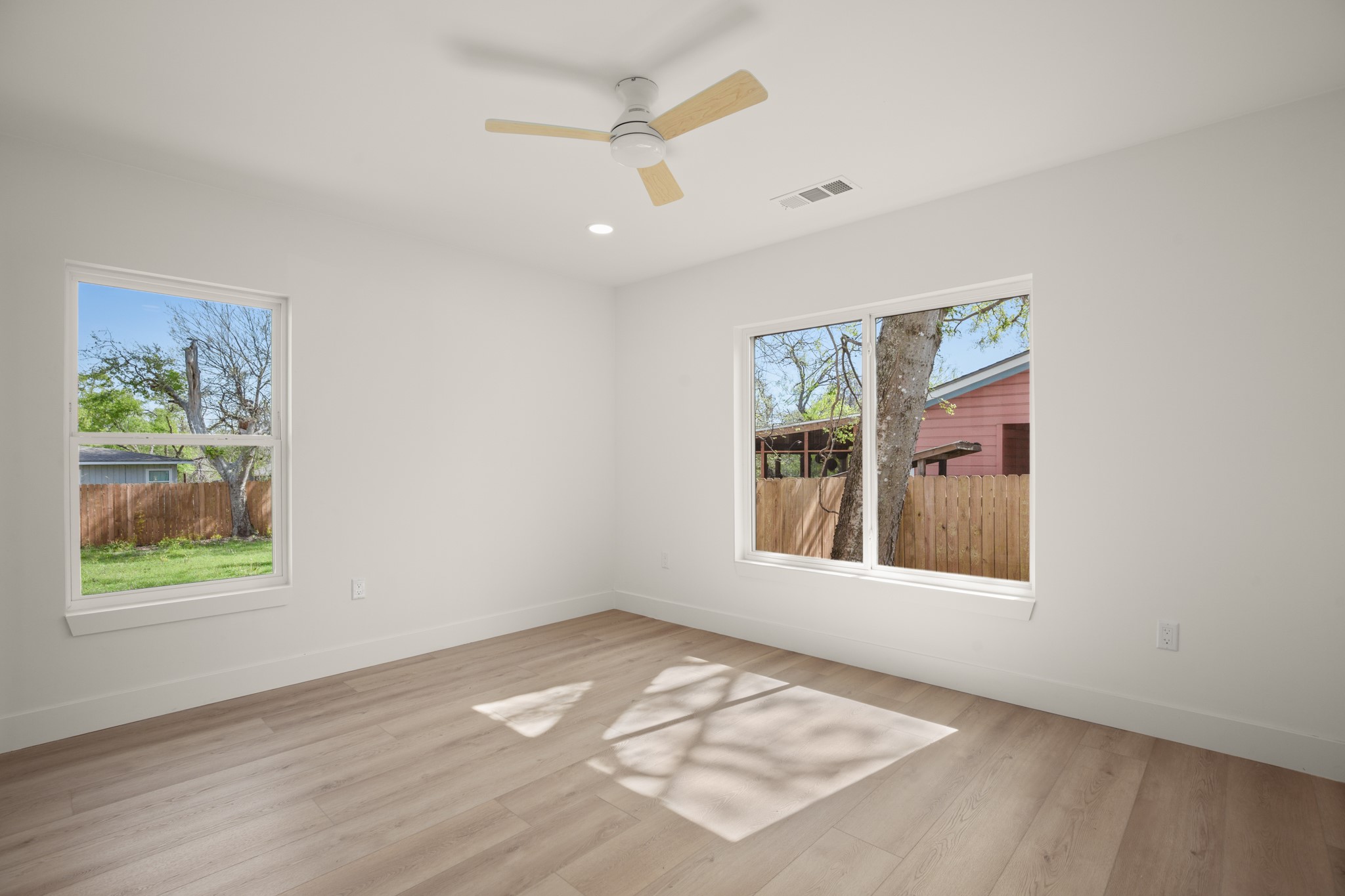 3308 Touchstone Street Austin, TX 78723 - Photo 16 of 38 Empty room featuring light wood-type flooring, recessed lighting, and ceiling fan