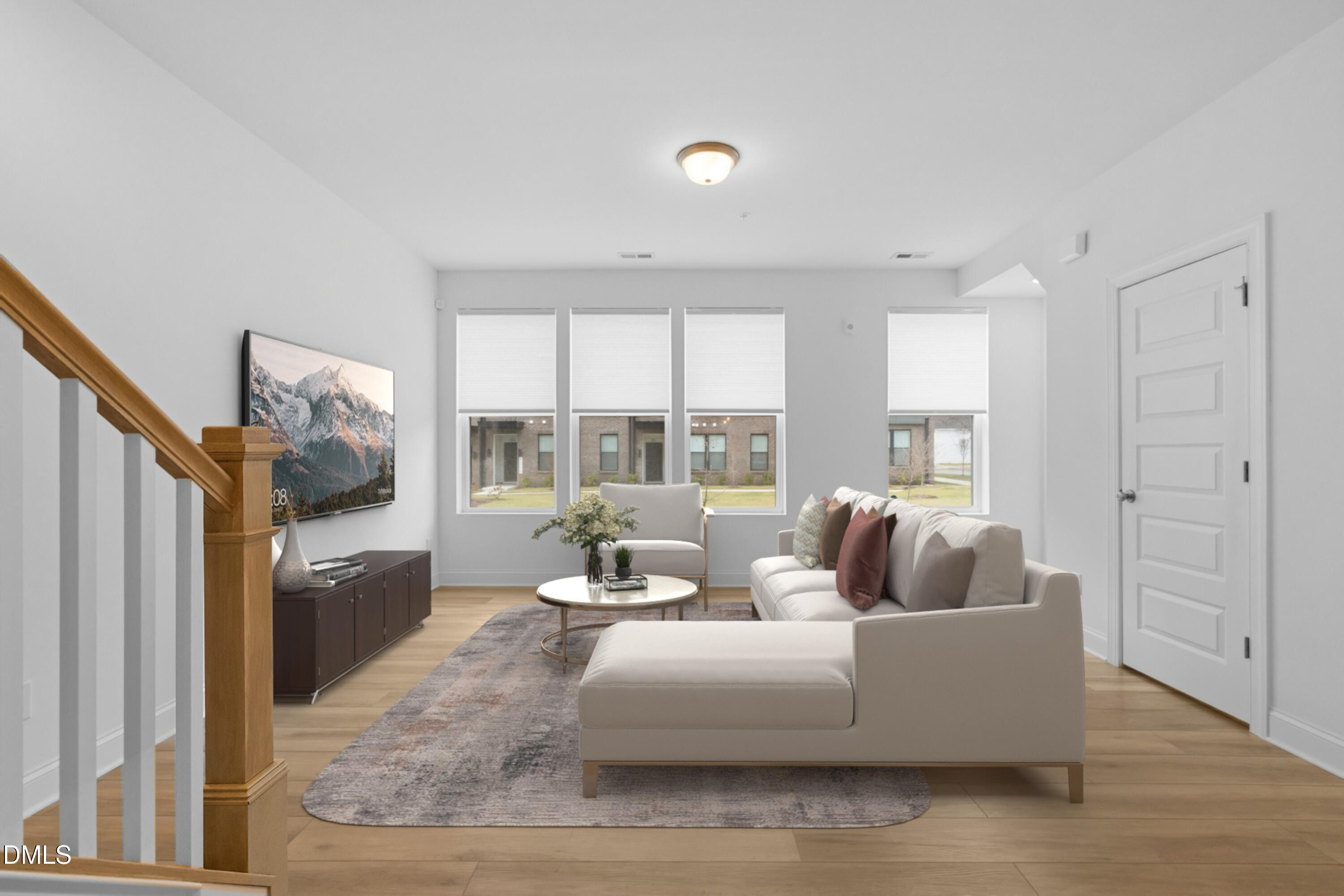 1206 Coach Station Alley Raleigh, NC 27601 - Photo 2 of 38 a living room with furniture and a flat screen tv