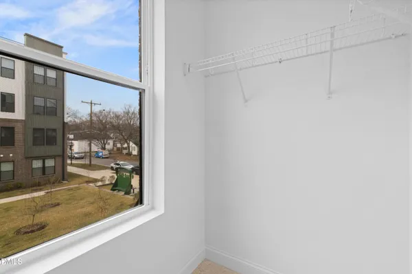 a bathroom with double sink and a mirror