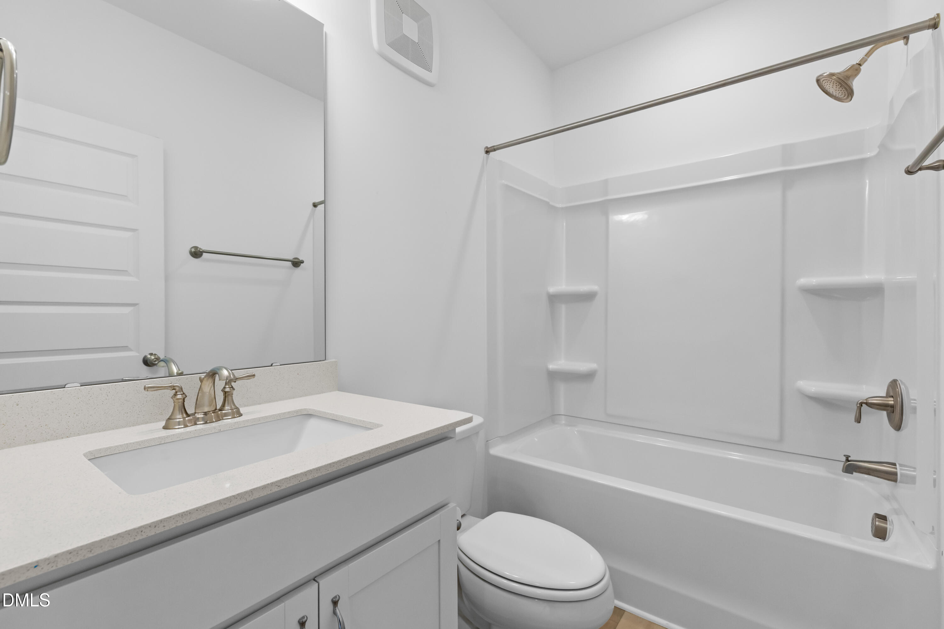 1206 Coach Station Alley Raleigh, NC 27601 - Photo 30 of 38 a bathroom with a sink a toilet and shower