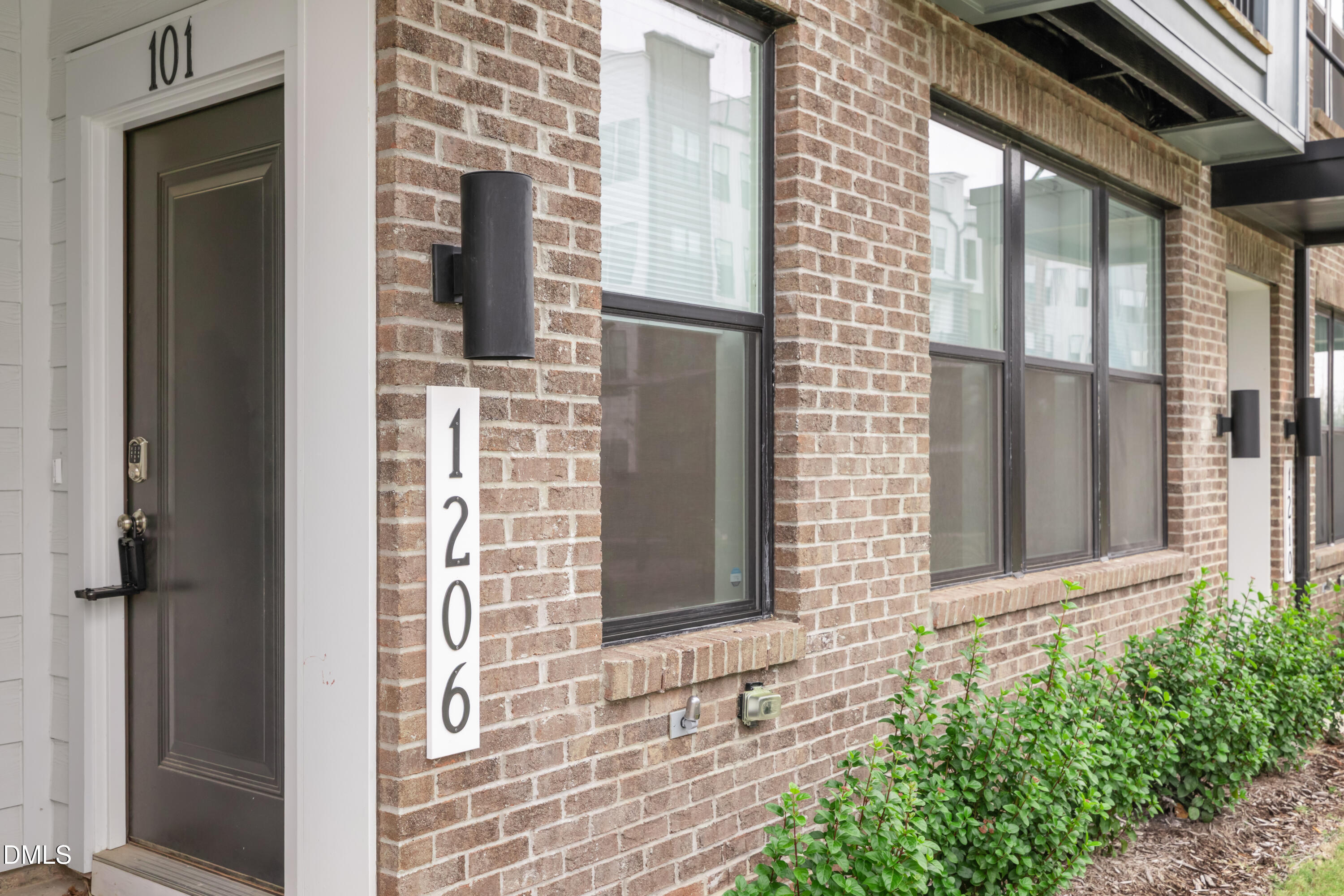 1206 Coach Station Alley Raleigh, NC 27601 - Photo 7 of 38 a view of front door of house