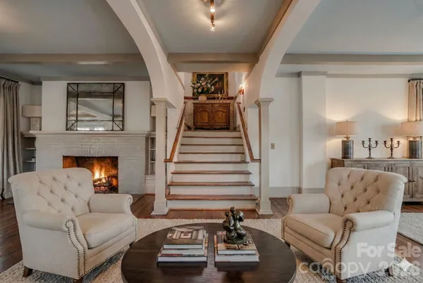 a bathroom with a double vanity sink toilet and shower
