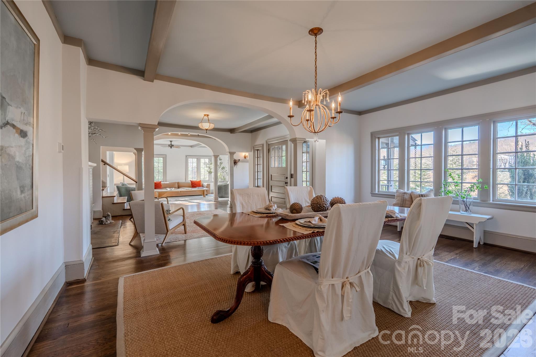 66 Fox Trot Lane Tryon, NC 28782 - Photo 14 of 48 a view of a dining room with furniture window and wooden floor