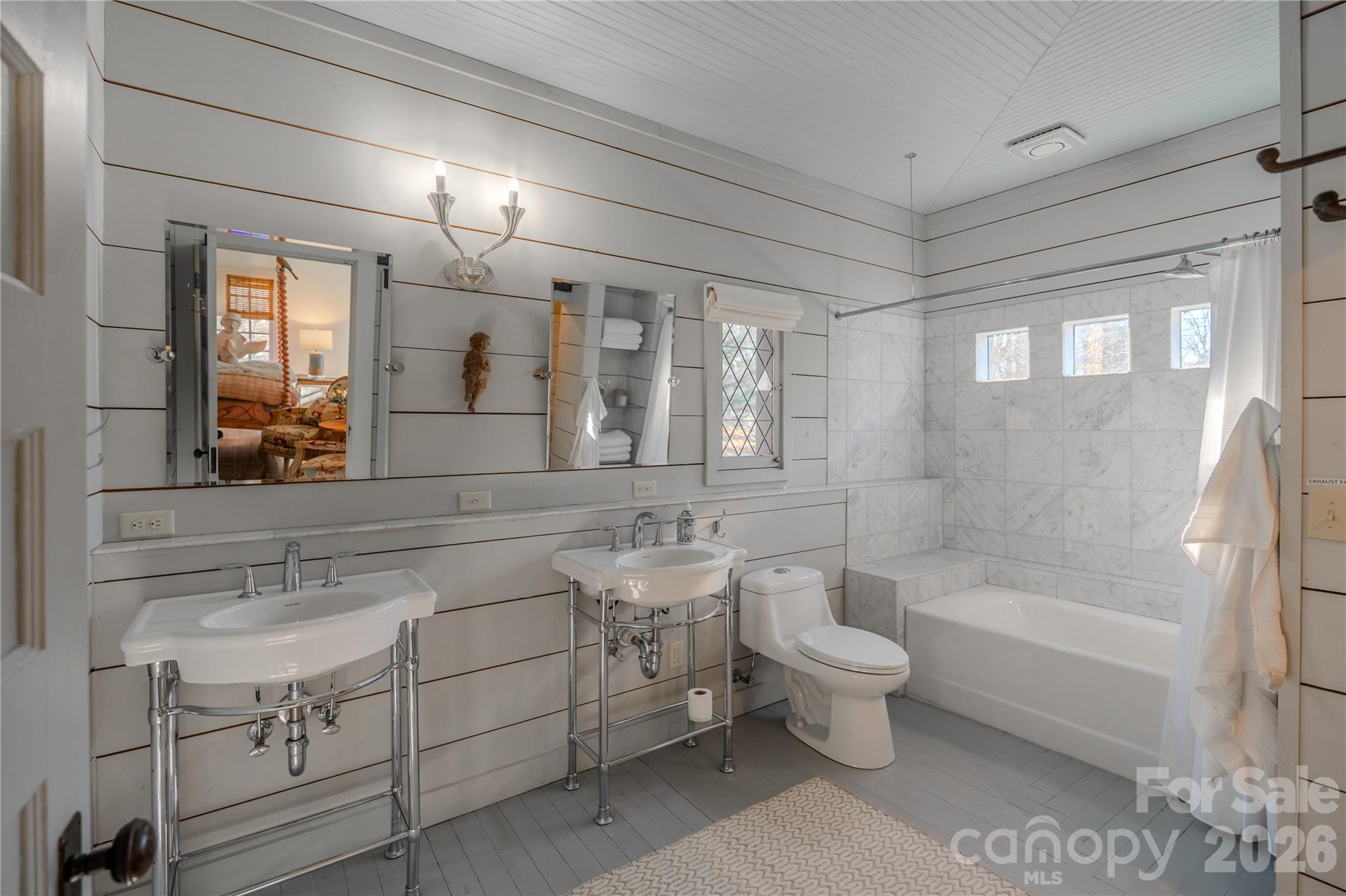 66 Fox Trot Lane Tryon, NC 28782 - Photo 24 of 48 a bathroom with a double vanity sink toilet and shower