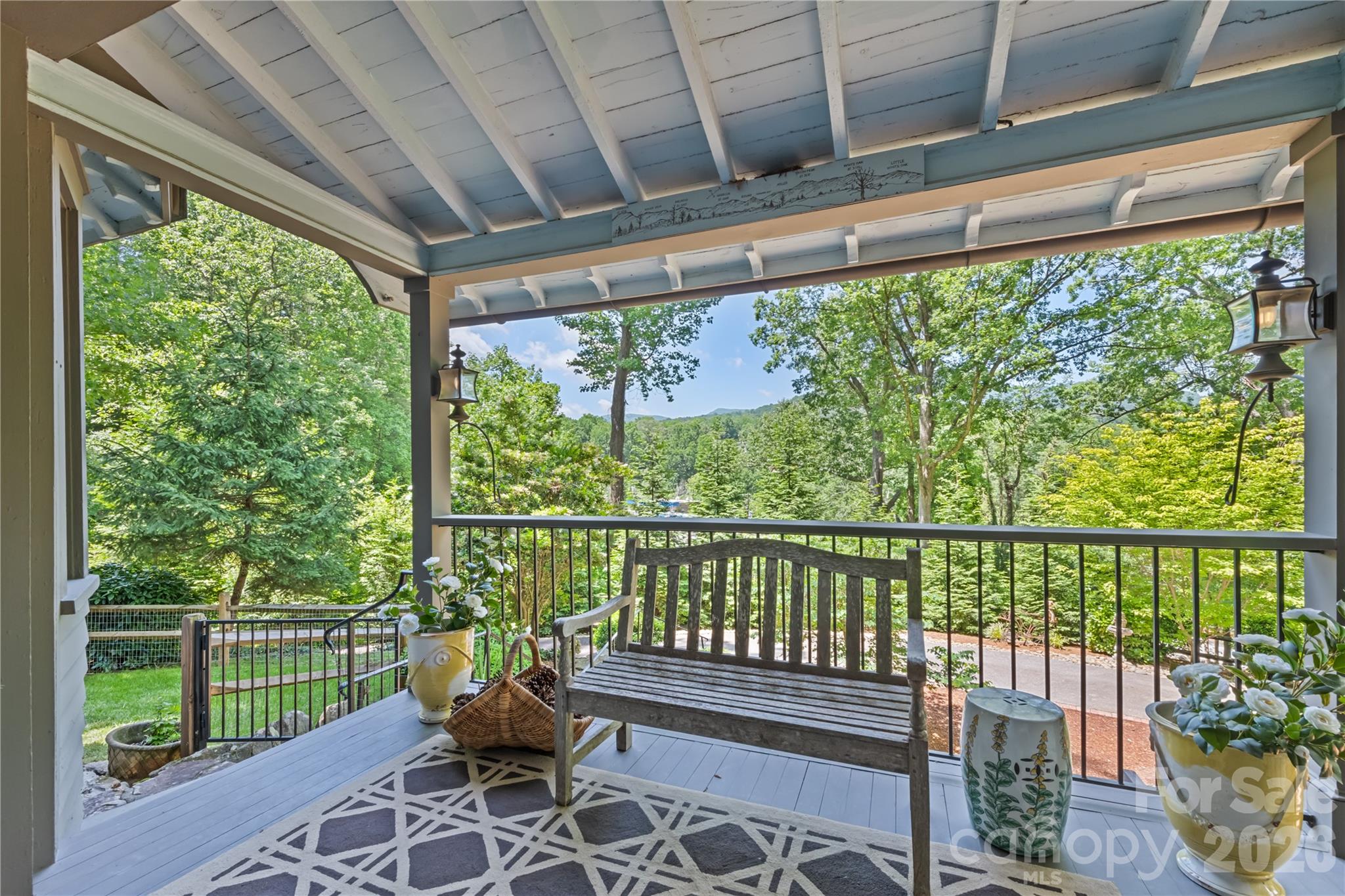 66 Fox Trot Lane Tryon, NC 28782 - Photo 8 of 48 a view of a chair and table in the balcony