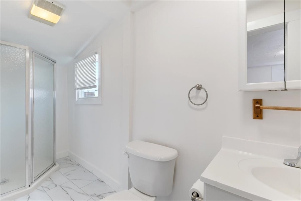 7 Cox Court Beverly, MA 01915 - Photo 11 of 23 a bathroom with a sink and a toilet