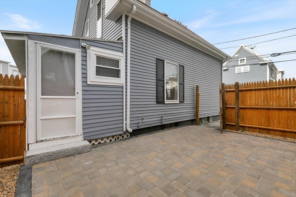 7 Cox Court Beverly, MA 01915 - Photo 17 of 23 a view of a house with a garage