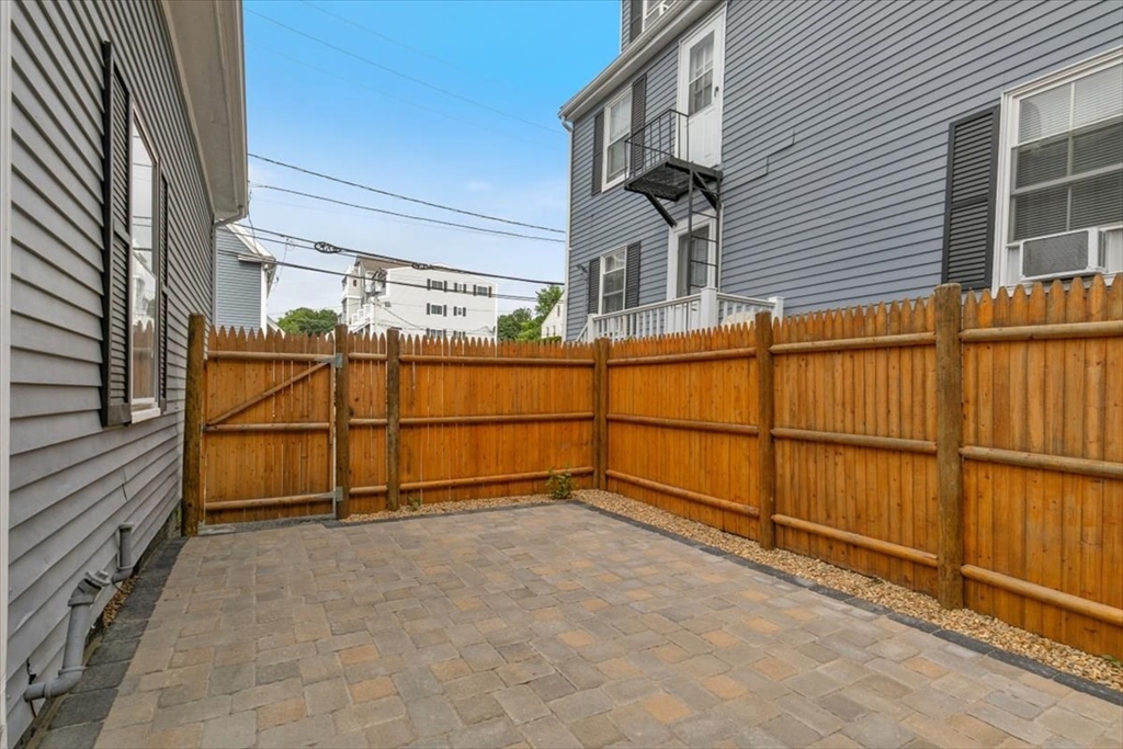 7 Cox Court Beverly, MA 01915 - Photo 18 of 23 a view of a house with a outdoor space