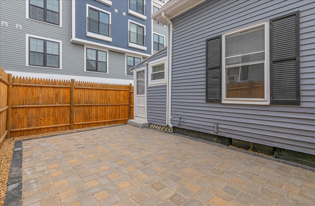 7 Cox Court Beverly, MA 01915 - Photo 19 of 23 a backyard of a house