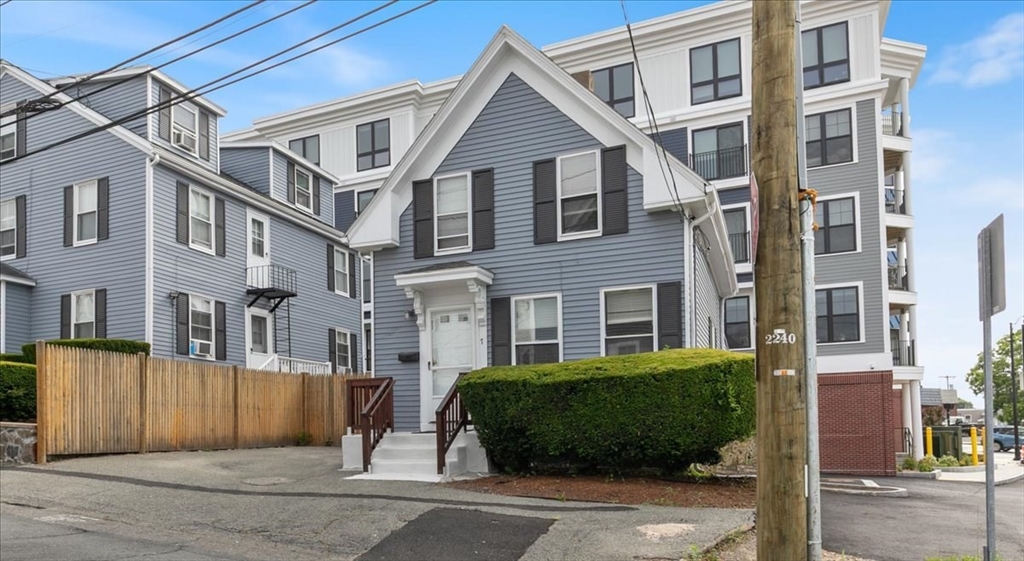 7 Cox Court Beverly, MA 01915 - Photo 20 of 23 a view of a white building among the street