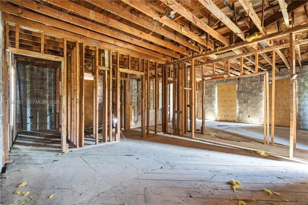 a view of a room with wooden walls