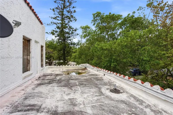 a view of a backyard of a house
