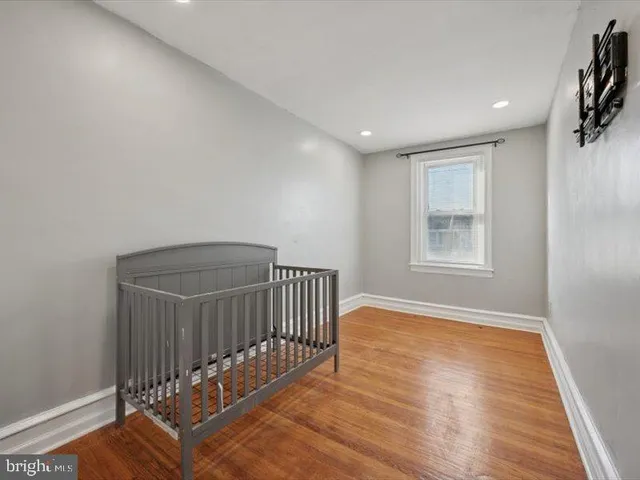 a view of livingroom with hardwood floor and a window
