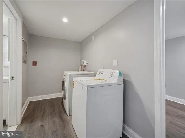 a utility room with dryer and washer