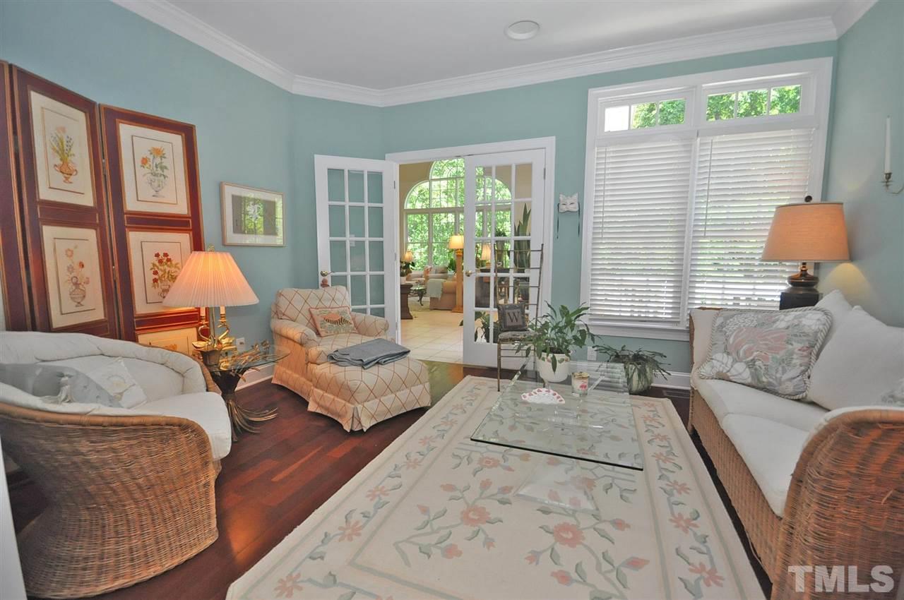 4 Trafalgar Place Durham, NC 27707 - Photo 11 of 27 a living room with furniture and a large window