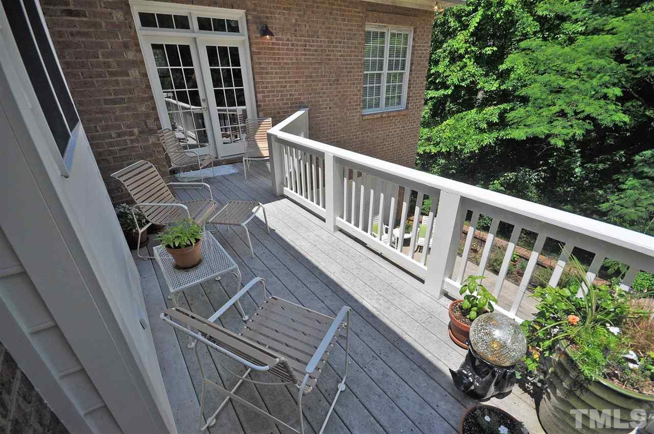 4 Trafalgar Place Durham, NC 27707 - Photo 22 of 27 a view of a balcony with wooden floor