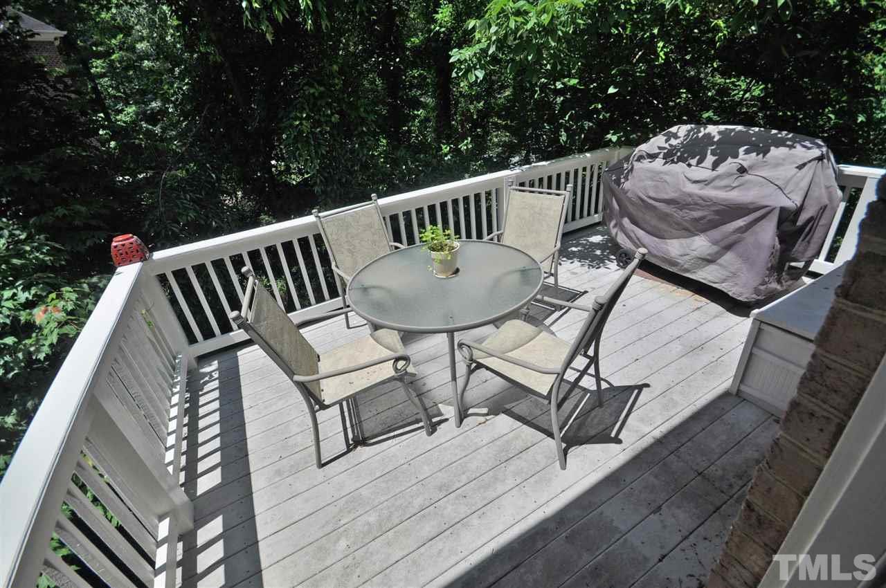 4 Trafalgar Place Durham, NC 27707 - Photo 23 of 27 a view of a chairs and table on the wooden floor