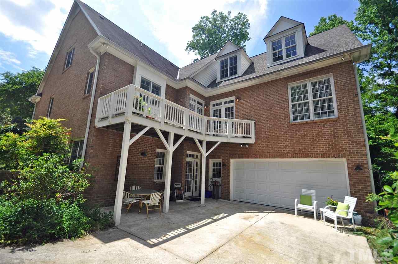 4 Trafalgar Place Durham, NC 27707 - Photo 24 of 27 a front view of a house with plants