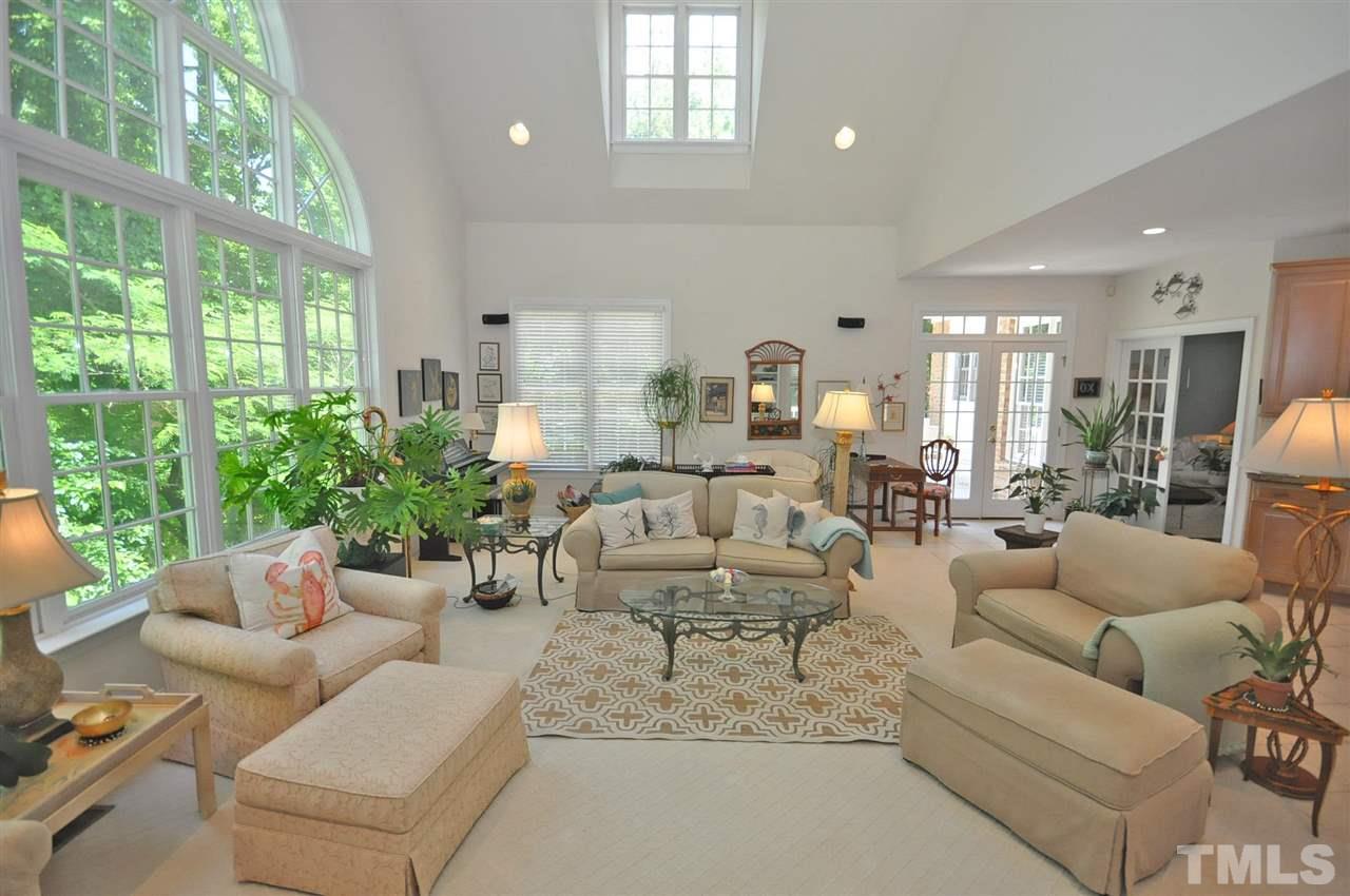 4 Trafalgar Place Durham, NC 27707 - Photo 8 of 27 a living room with furniture and a large window