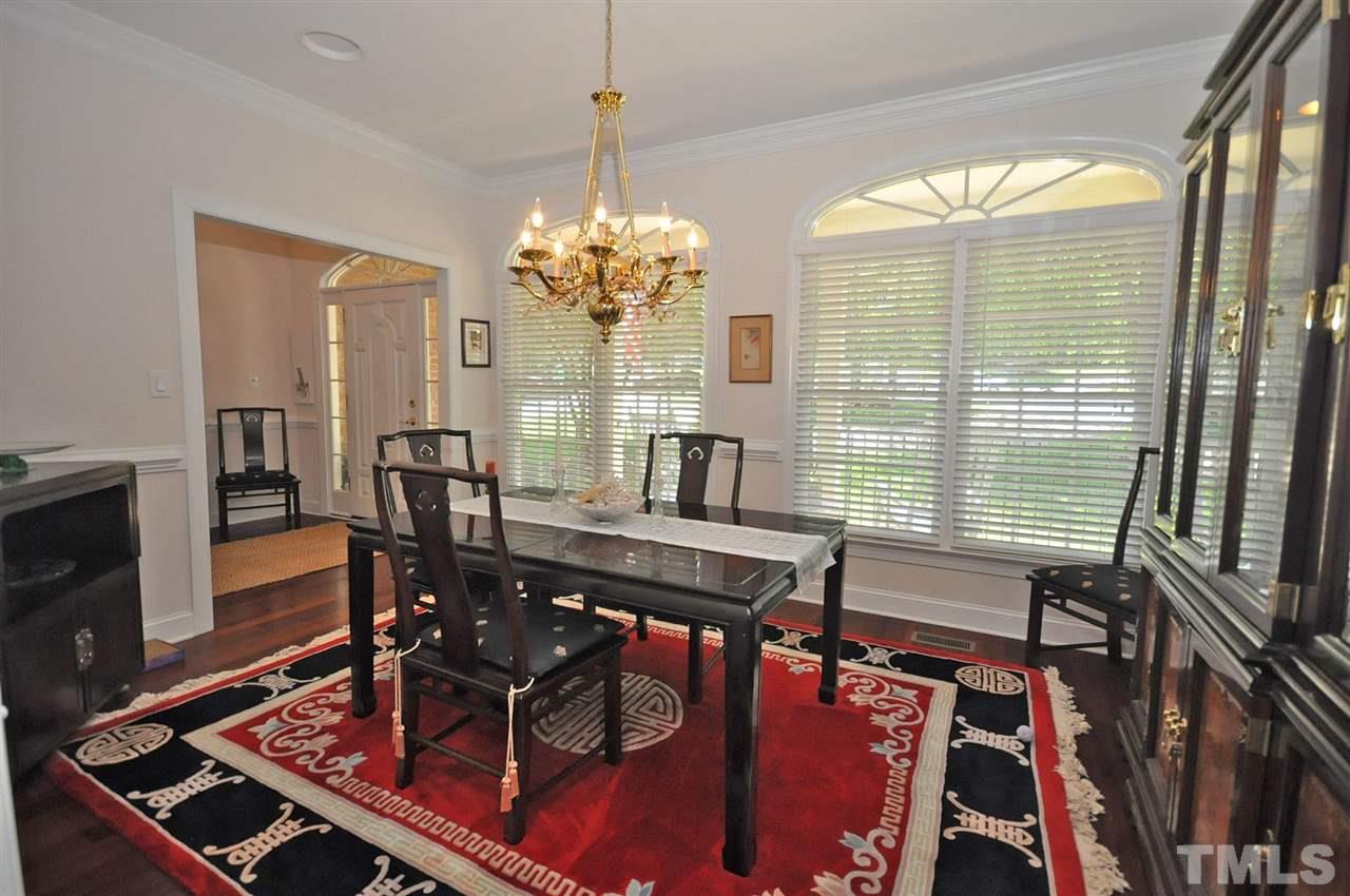 4 Trafalgar Place Durham, NC 27707 - Photo 9 of 27 a view of a dining room with furniture window and wooden floor