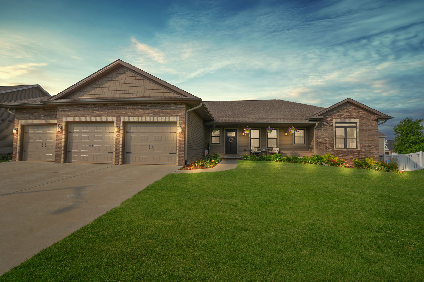 2235 North Bridge Drive Normal, IL 61761 - Photo 1 of 96 a front view of a house with a yard