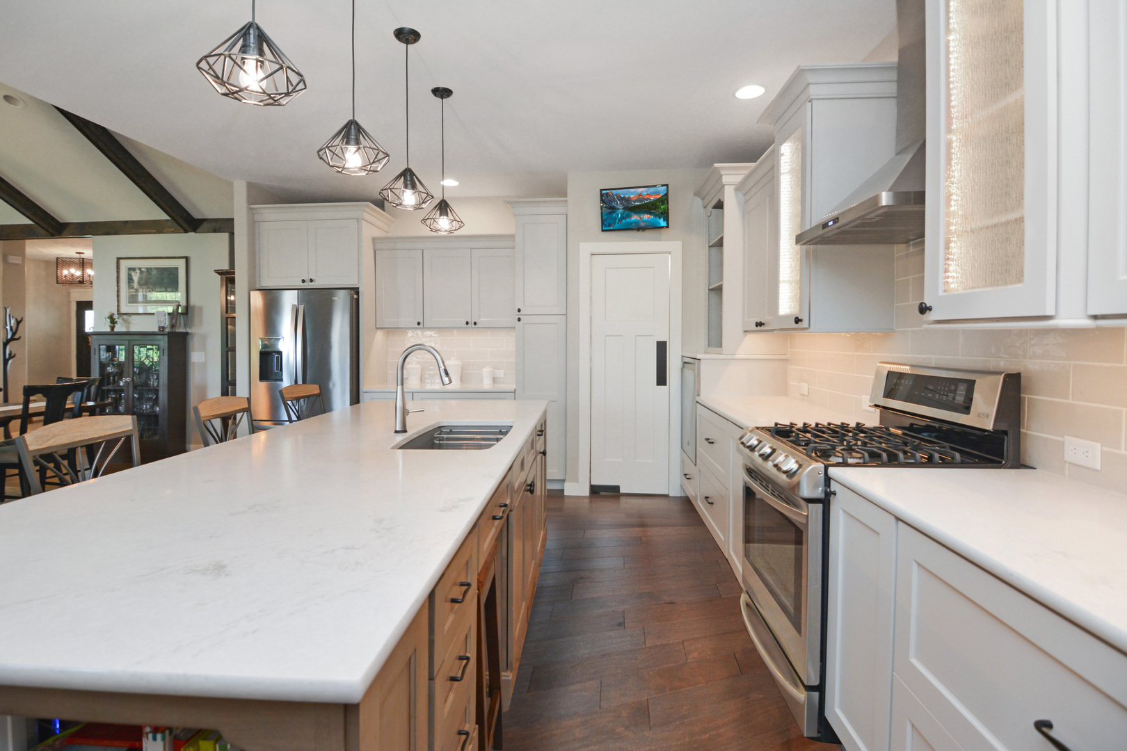 2235 North Bridge Drive Normal, IL 61761 - Photo 16 of 96 a kitchen with kitchen island a stove a sink a center island and cabinets