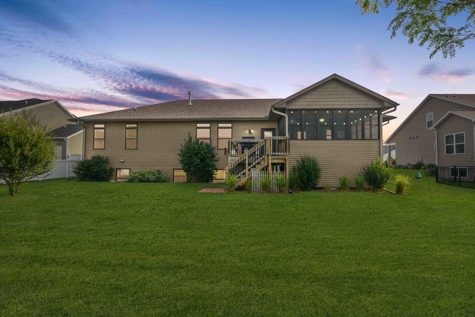 2235 North Bridge Drive Normal, IL 61761 - Photo 2 of 96 a front view of a house with garden