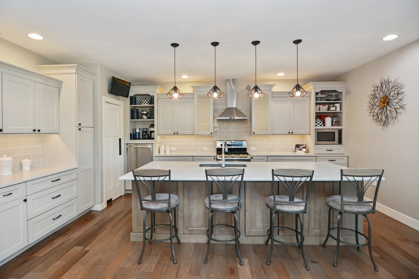2235 North Bridge Drive Normal, IL 61761 - Photo 75 of 96 a kitchen with stainless steel appliances kitchen island granite countertop a table chairs and a refrigerator