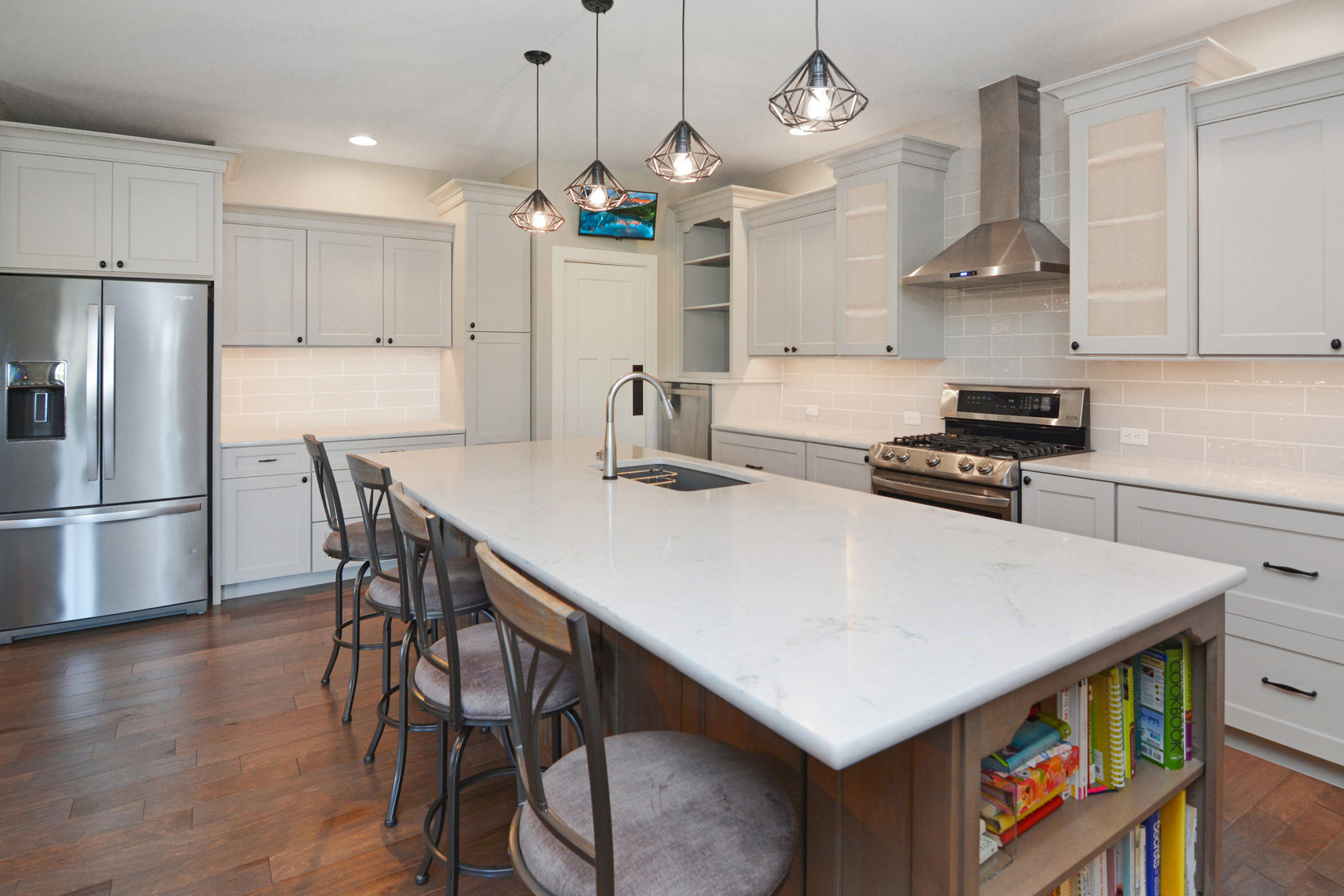 2235 North Bridge Drive Normal, IL 61761 - Photo 79 of 96 a kitchen with stainless steel appliances a table chairs stove and refrigerator