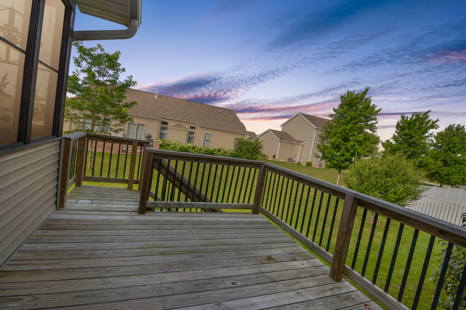 2235 North Bridge Drive Normal, IL 61761 - Photo 90 of 96 a view of a balcony with wooden floor