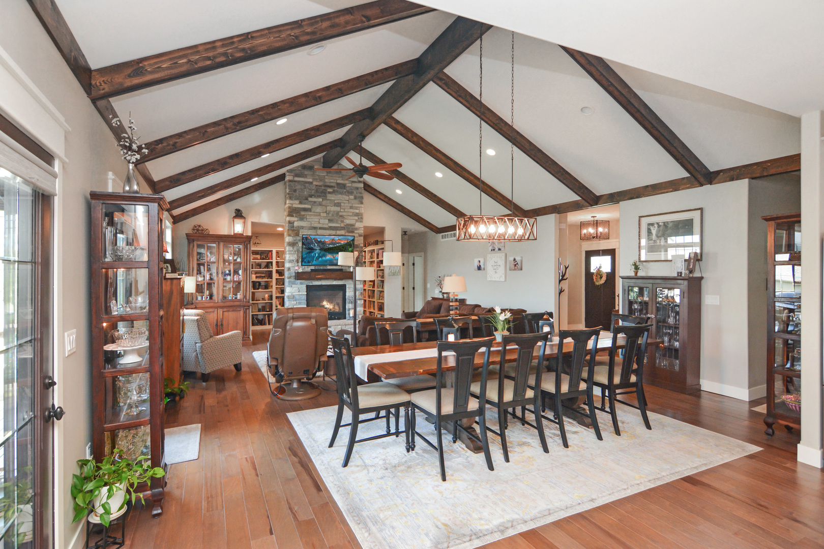 2235 North Bridge Drive Normal, IL 61761 - Photo 9 of 96 a view of a dining room with furniture and wooden floor