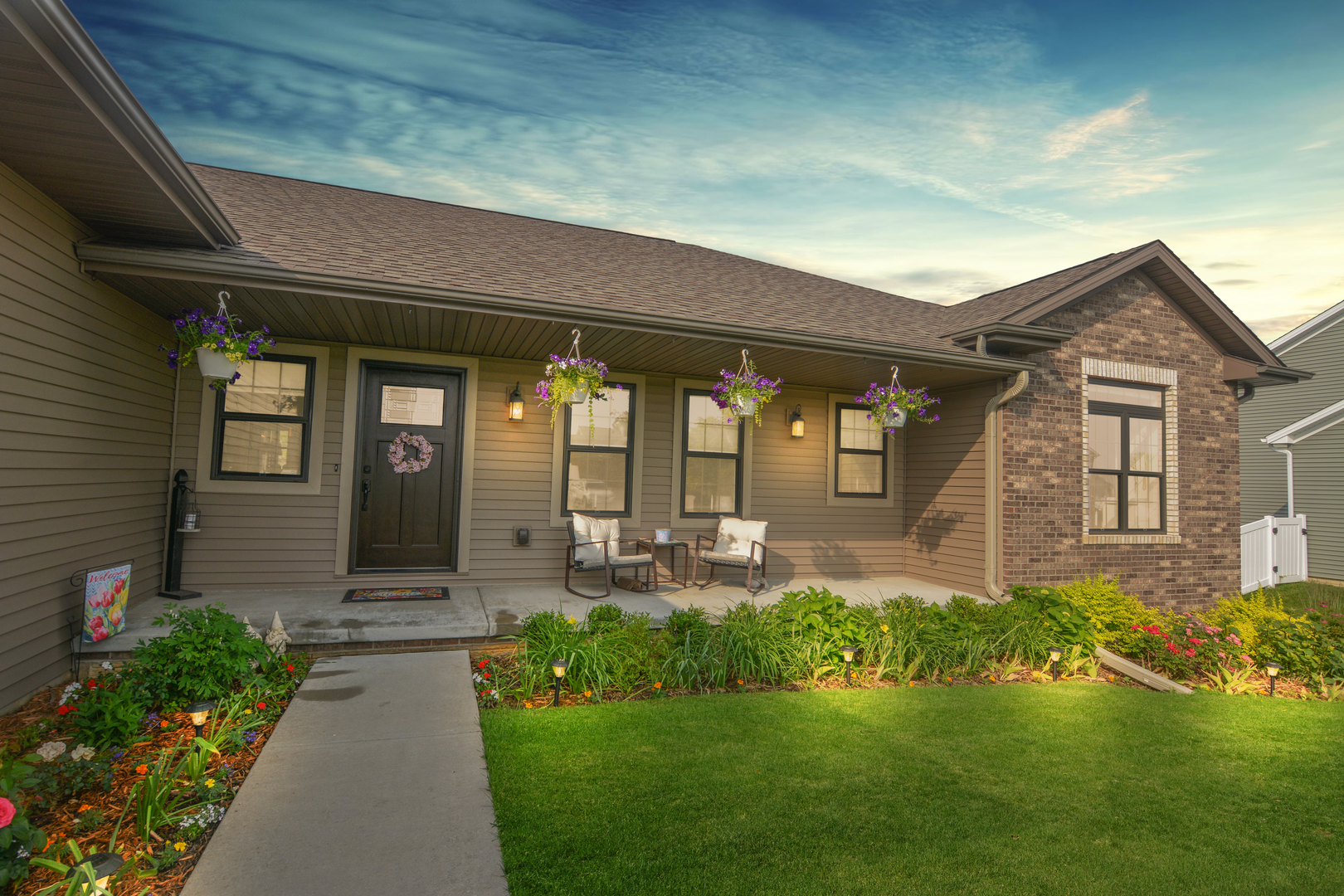 2235 North Bridge Drive Normal, IL 61761 - Photo 92 of 96 a front view of a house with garden