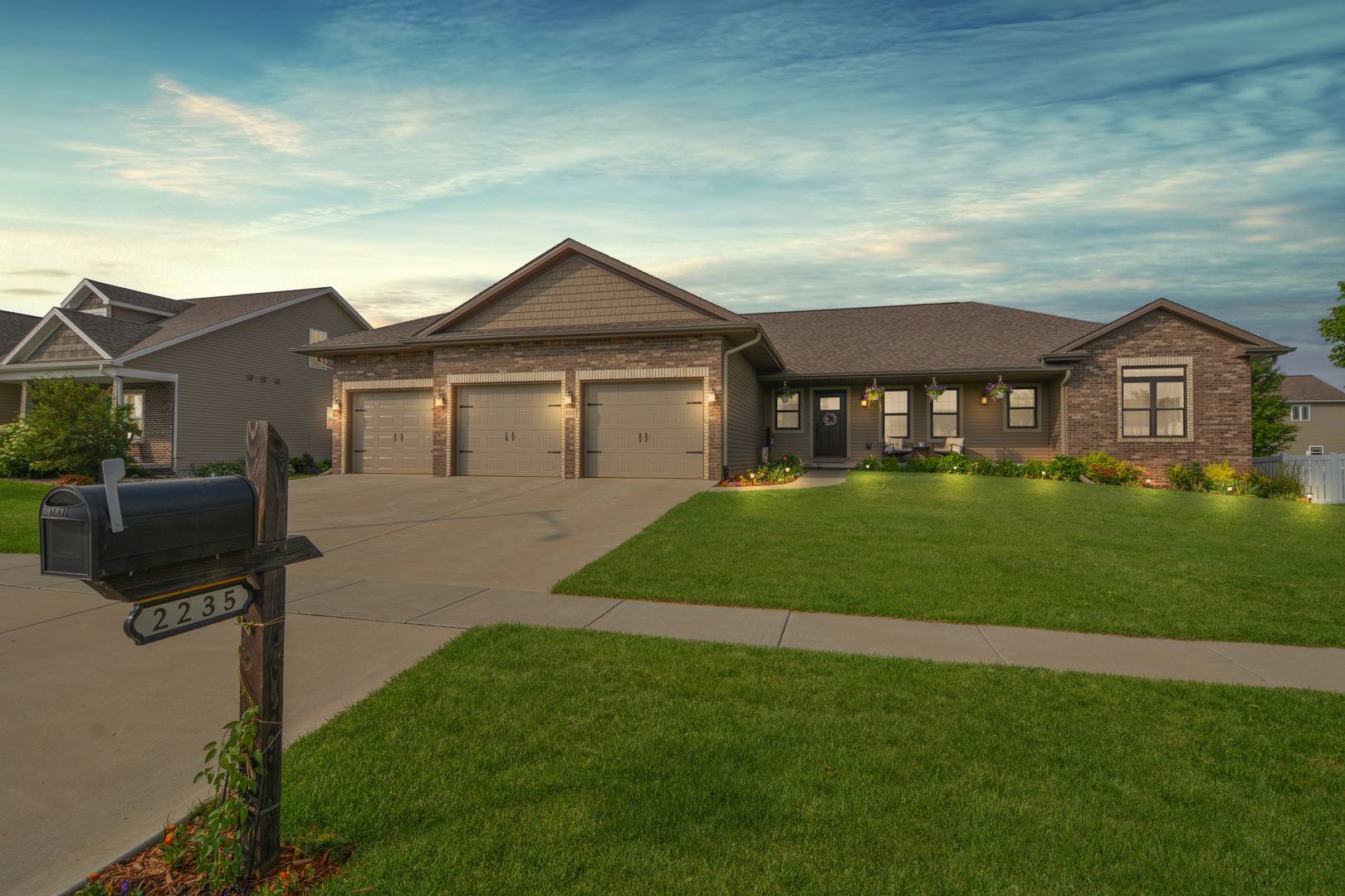2235 North Bridge Drive Normal, IL 61761 - Photo 93 of 96 a front view of a house with a garden