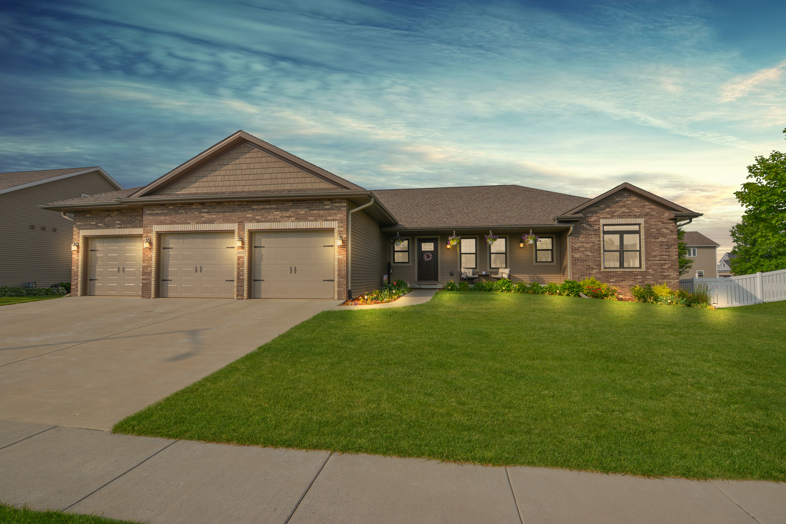 2235 North Bridge Drive Normal, IL 61761 - Photo 94 of 96 a front view of a house with a garden