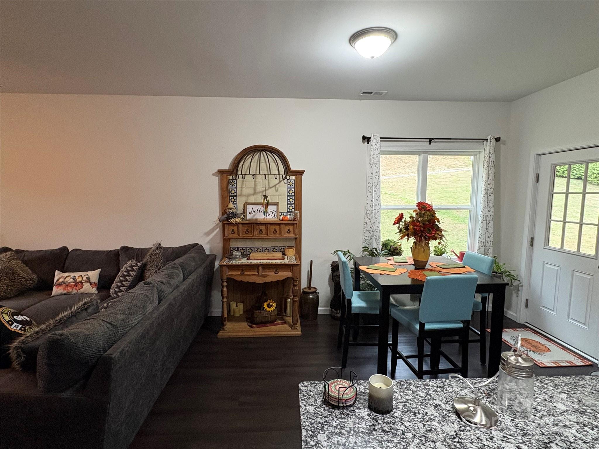 10 Scarlett Ridge Drive Marshall, NC 28753 - Photo 21 of 31 a living room with furniture a window and a table