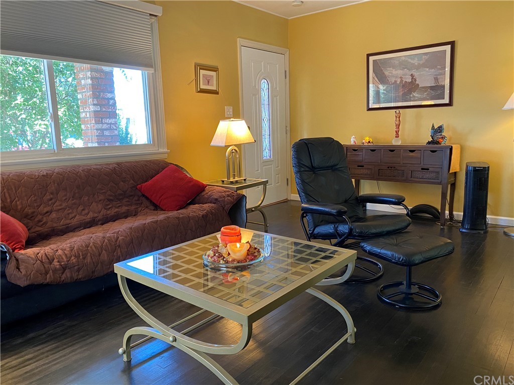 7548 Security Avenue Burbank, CA 91504 - Photo 15 of 41 a living room with furniture and wooden floor