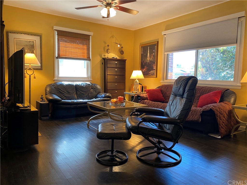 7548 Security Avenue Burbank, CA 91504 - Photo 18 of 41 a living room with furniture a window and gym equipment