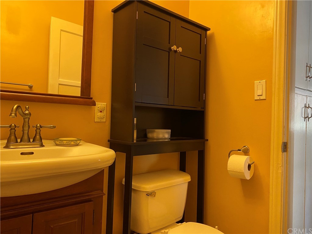 7548 Security Avenue Burbank, CA 91504 - Photo 29 of 41 a bathroom with a sink and a toilet