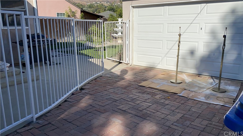 7548 Security Avenue Burbank, CA 91504 - Photo 4 of 41 a view of a porch with a door