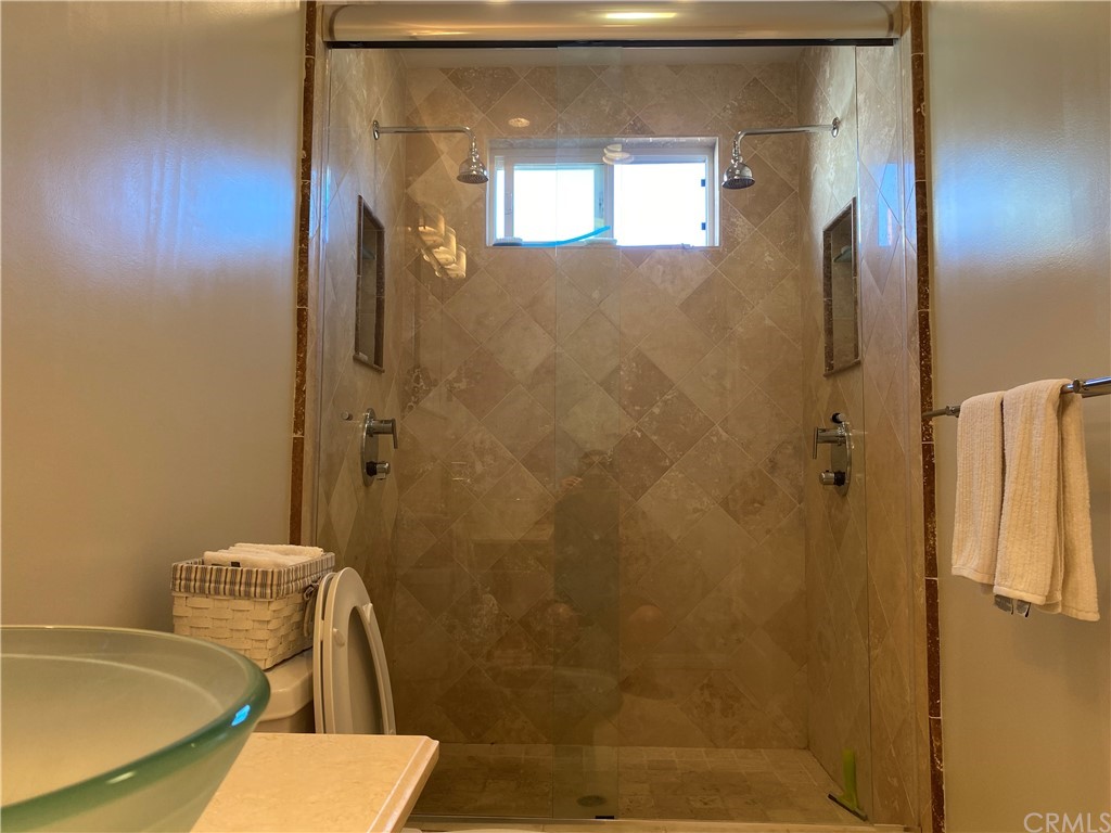 7548 Security Avenue Burbank, CA 91504 - Photo 34 of 41 a bathroom with a sink and a mirror