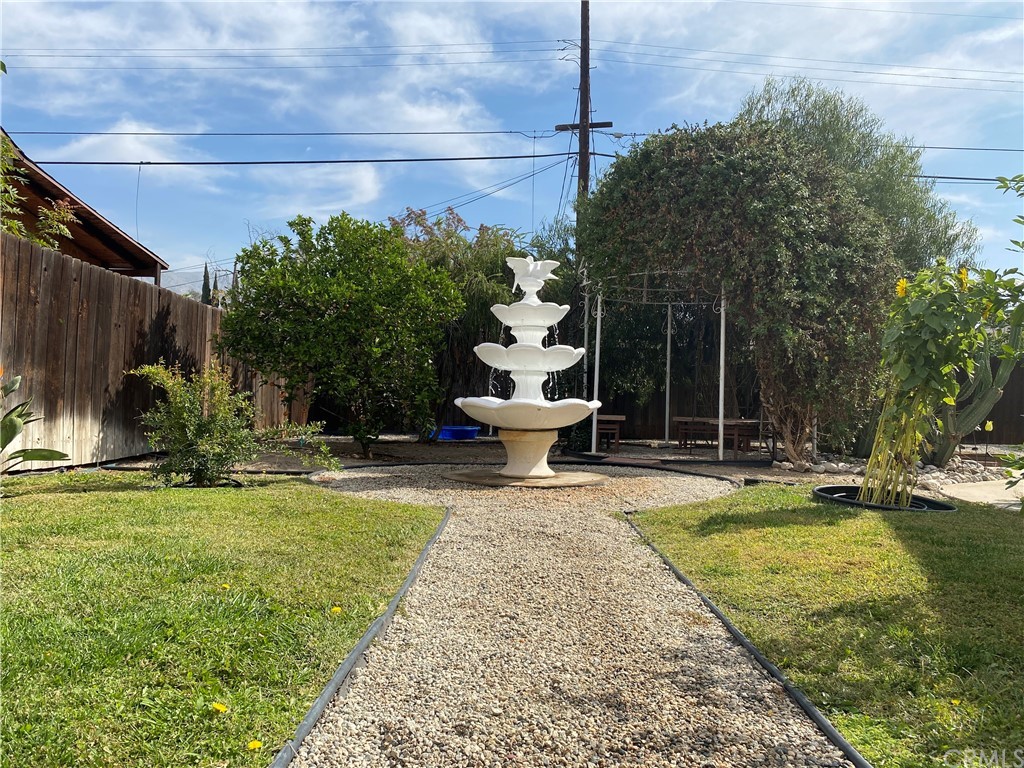7548 Security Avenue Burbank, CA 91504 - Photo 9 of 41 a view of a house with backyard and sitting area