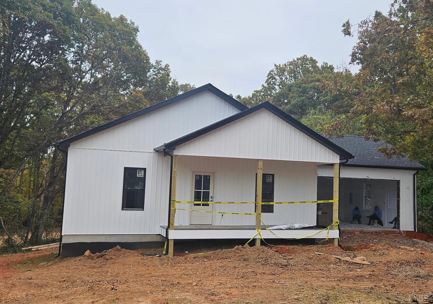 209 Spicer Road Lynchburg, VA 24504 - Photo 1 of 13 a view of a house with a yard and large tree