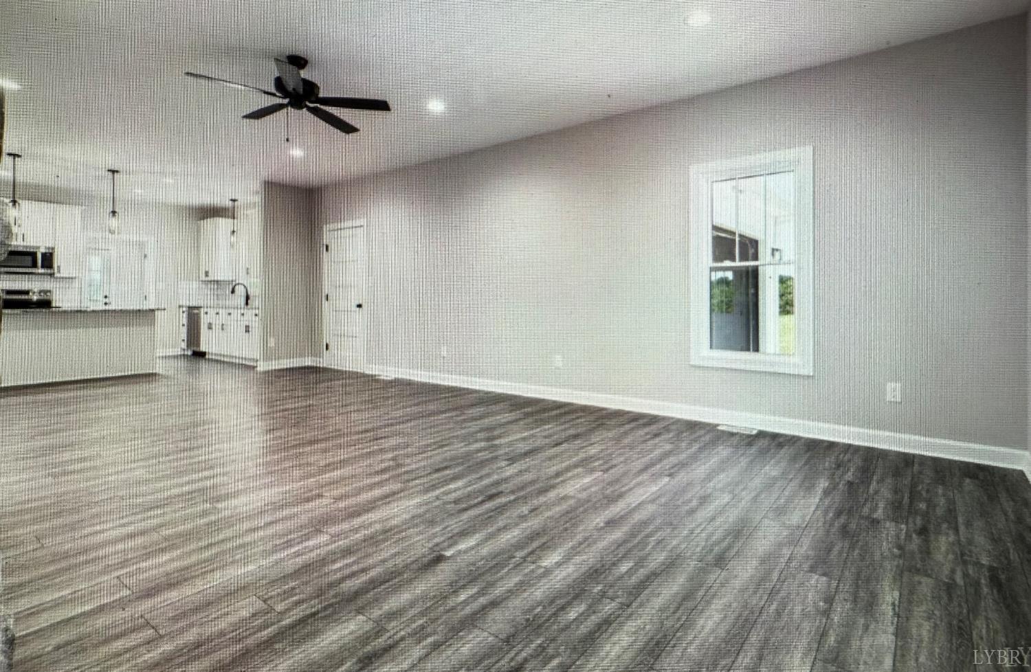 209 Spicer Road Lynchburg, VA 24504 - Photo 2 of 13 a view of an empty room with a window