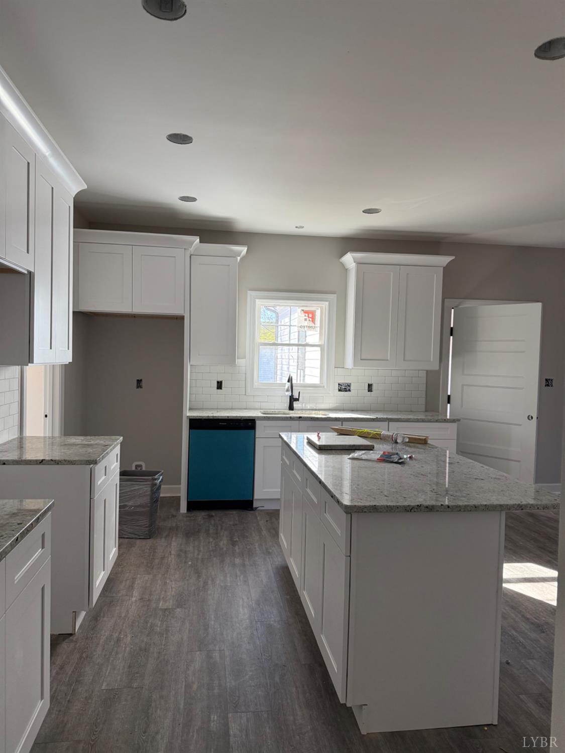 209 Spicer Road Lynchburg, VA 24504 - Photo 5 of 13 a kitchen with stainless steel appliances granite countertop a stove a sink and a refrigerator