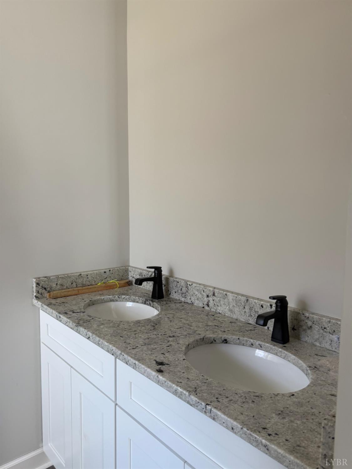 209 Spicer Road Lynchburg, VA 24504 - Photo 10 of 13 a bathroom with a granite countertop sink and vanity