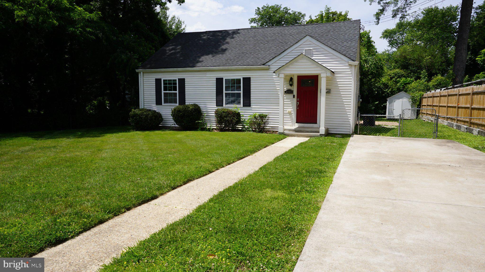 Charming home with vibrant curb appeal.