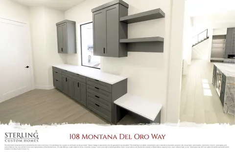 a bathroom with a sink a mirror and a